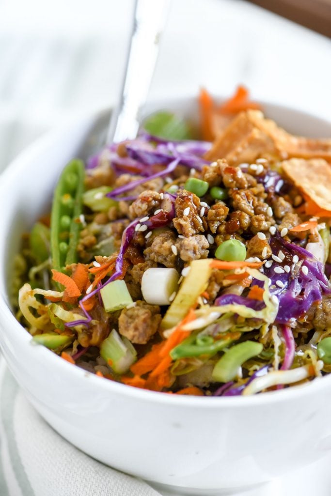 egg roll bowl with crispy wontons and fork