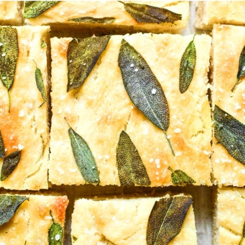 sage focaccia bread topped with sage leaves