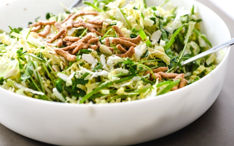 Chinese coleslaw topped with sesame sticks