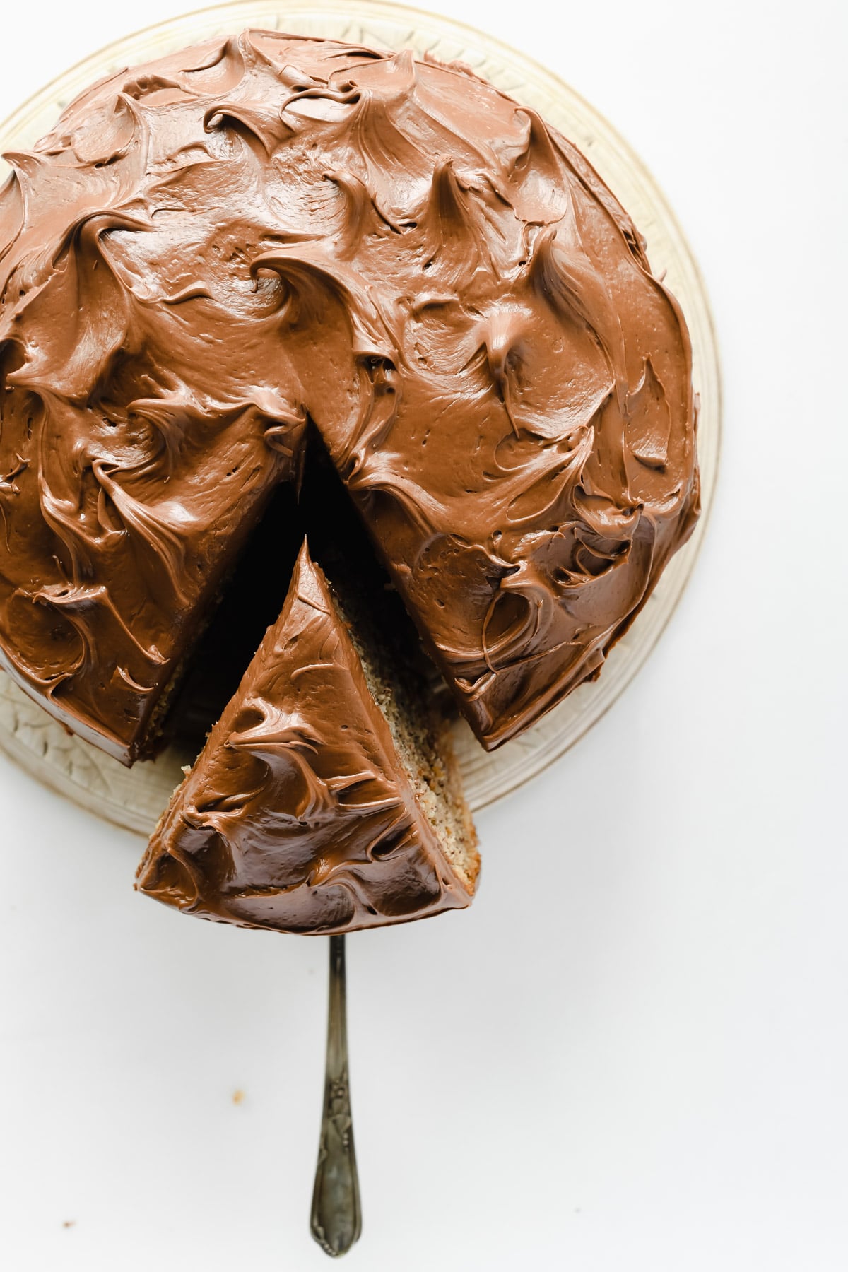 Overhead look at a chocolate Nutella layer cake.