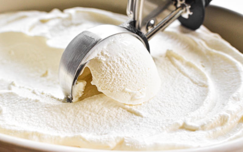 scooping honey vanilla frozen yogurt