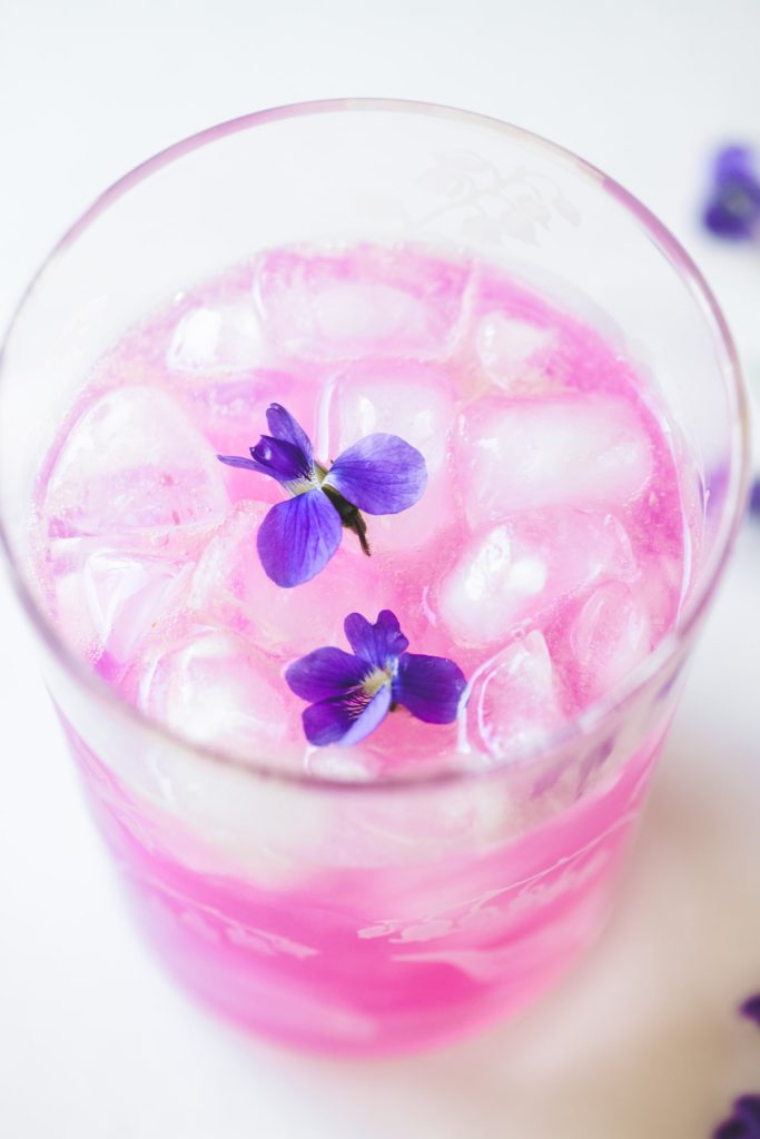 wild violet lemonade in a glass.
