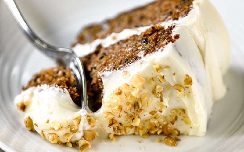 a slice of zucchini cake, with fork