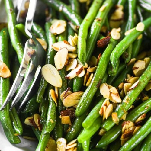 green beans almondine in a serving bowl.