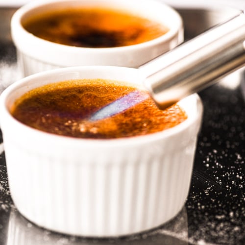 Using a kitchen torch to make pumpkin creme brulee.