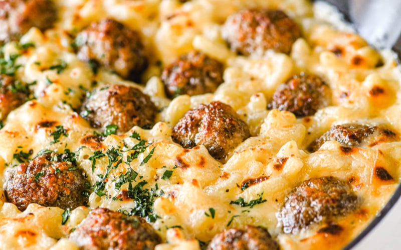 meatball macaroni and cheese in a skillet.