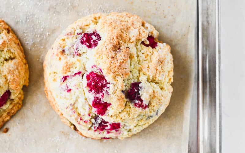 Raspberry Scone on a baking sheet.