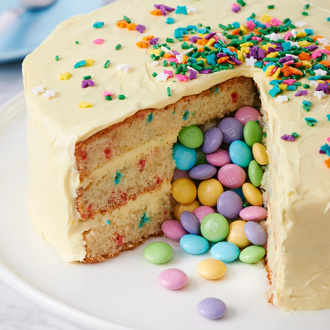 Easter cake cut open to reveal candy.