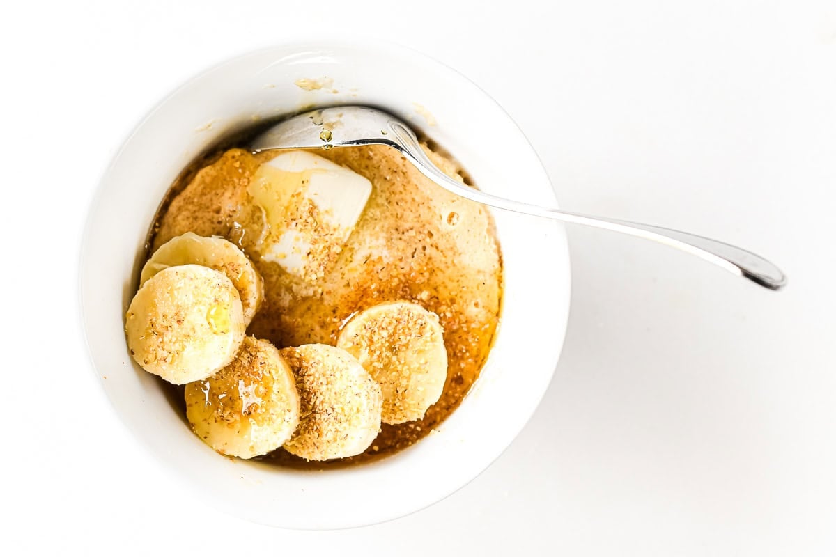 protein pancake bowl topped with bananas and wheat germ.