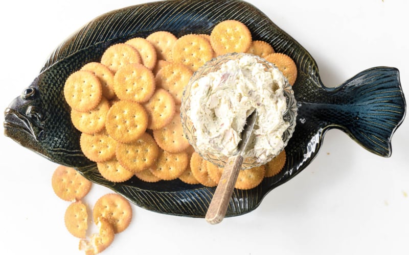 smoked whitefish dip with Ritz crackers on a fish platter.