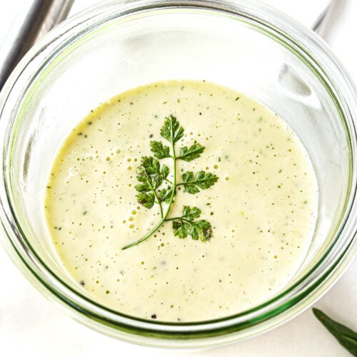 30 second Béarnaise sauce in a jar with sprig of chervil.