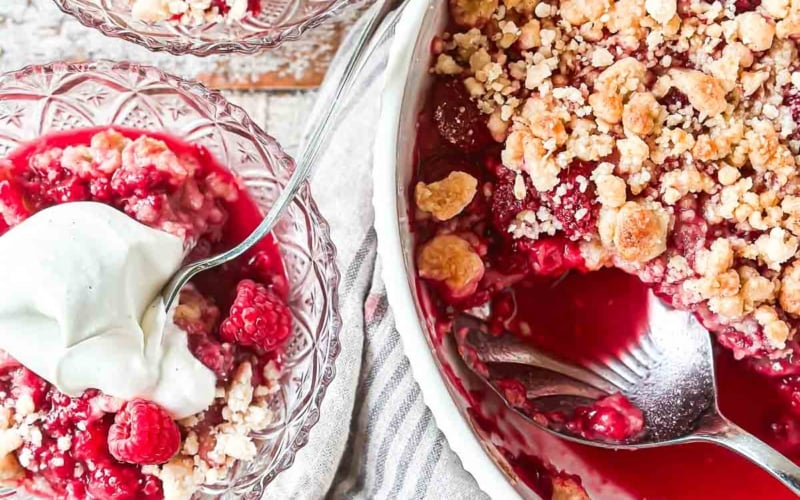 raspberry crisp in pan with spoon.