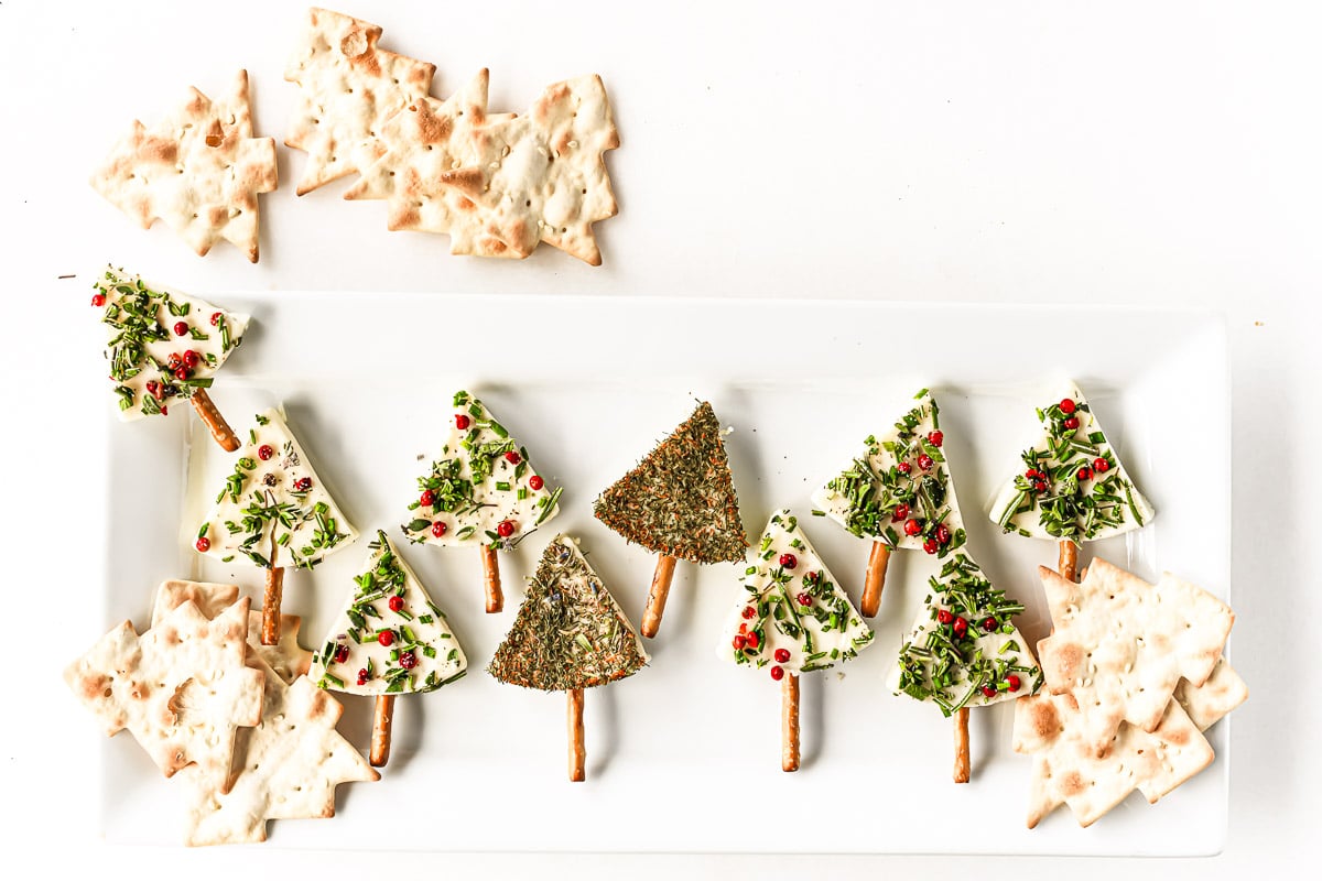 Holiday Appetizer cheese trees with pretzel trunks.