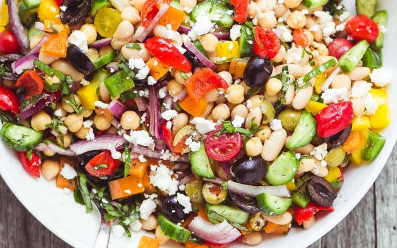 Mediterranean Bean Salad in a white bowl.