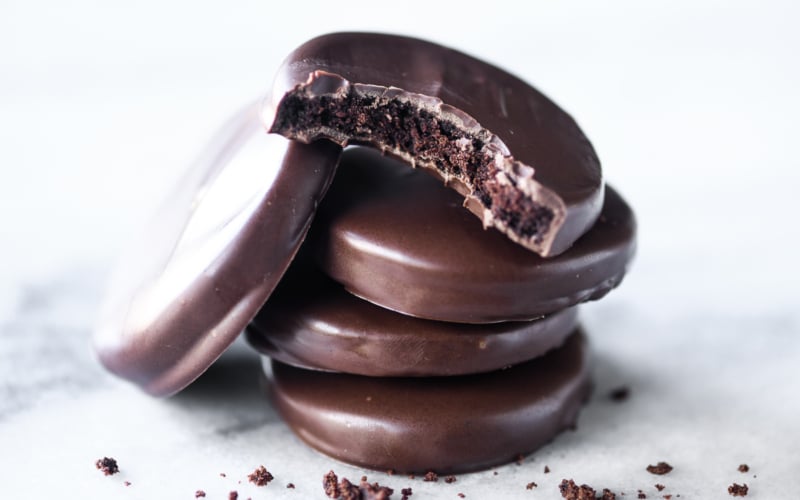 stack of homemade Thin Mints, with crumbs.