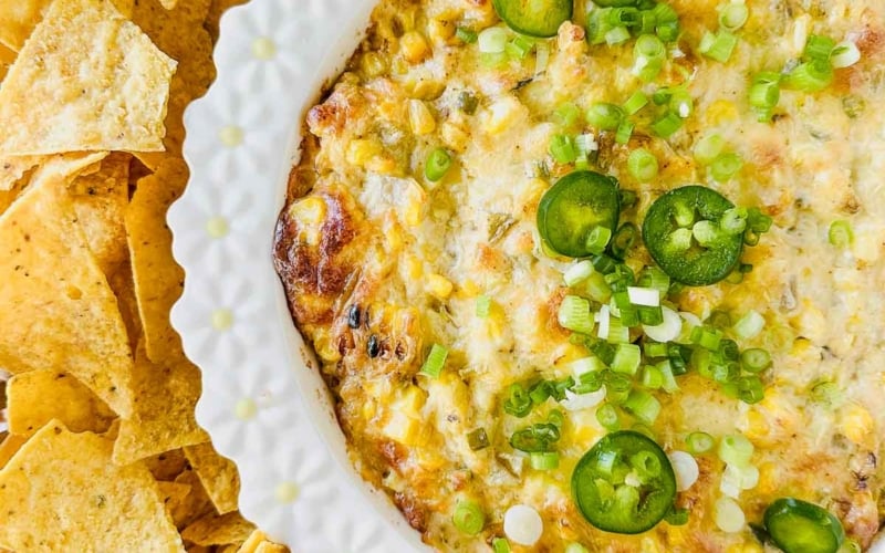 Creamy roasted corn dip with tortilla chips.