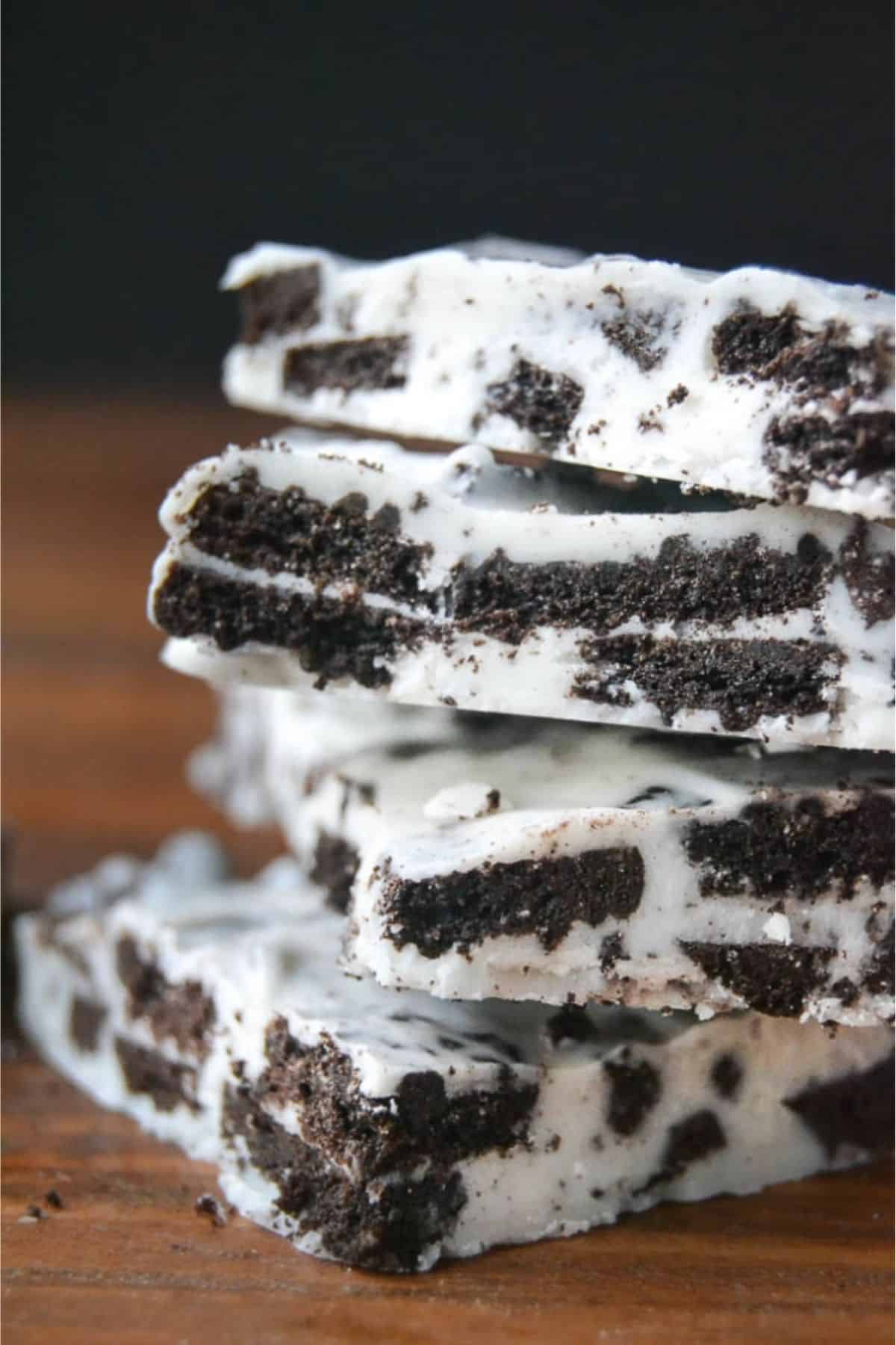 Pieces of cookies and cream bark, stacked.
