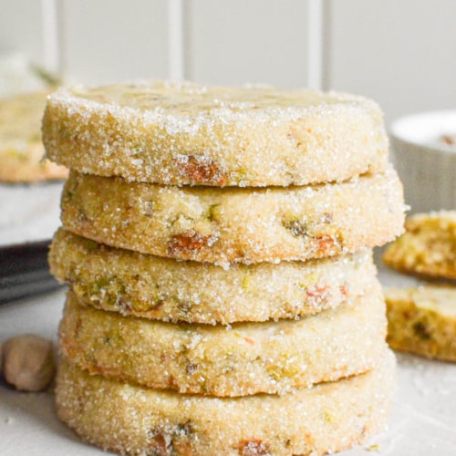 A stack of pistachio shortbread cookies.