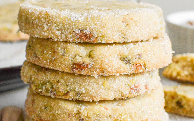 A stack of pistachio shortbread cookies.