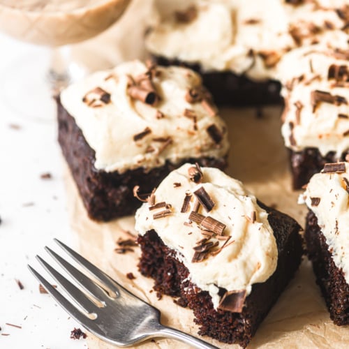 Irish Cream Cake sliced into bars, with a fork.