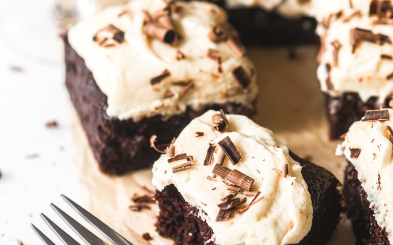 Irish Cream Cake sliced into bars, with a fork.