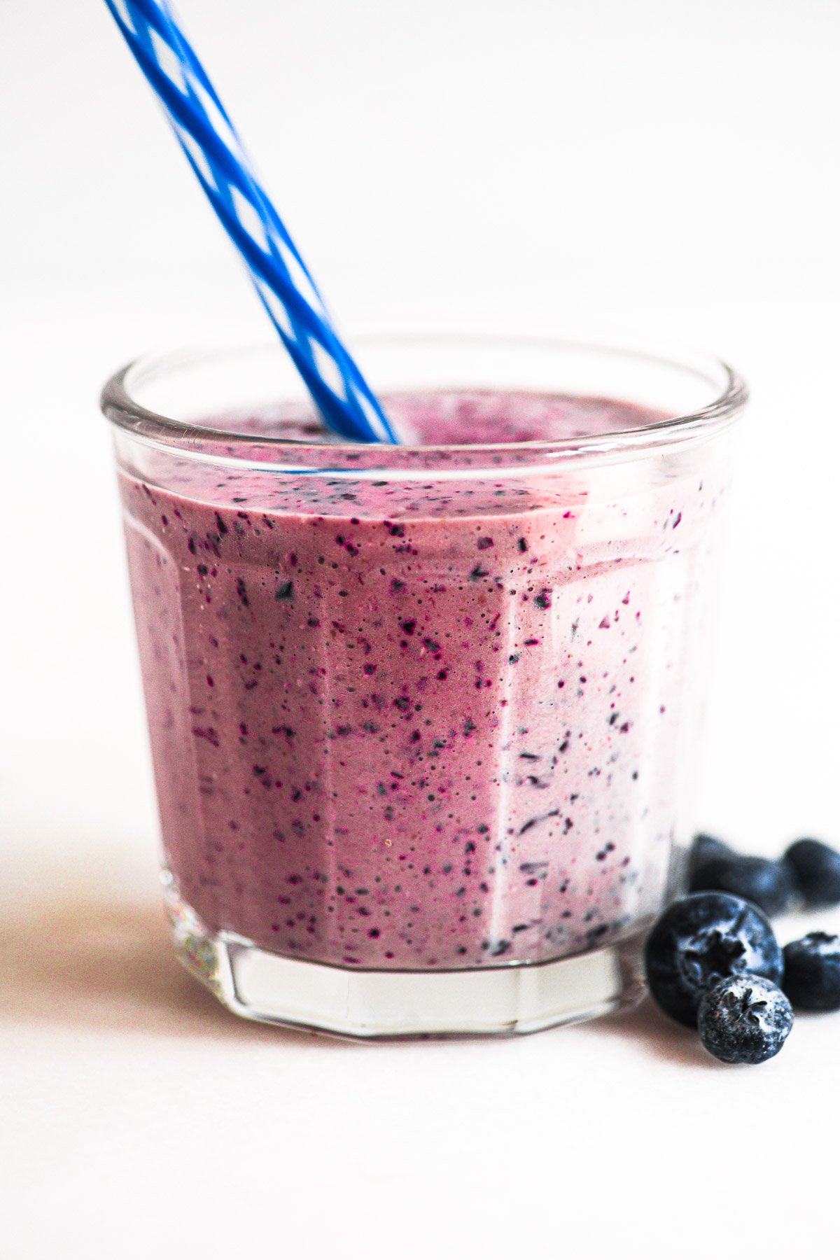 kefir smoothie with blueberries and straw