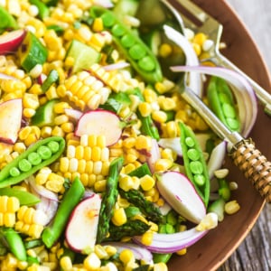 first corn salad of the season, in a wooden bowl.