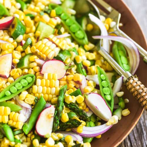 first corn salad of the season, in a wooden bowl.