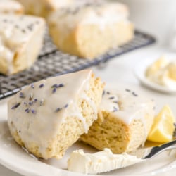 lemon lavender scones on a plate with clotted cream