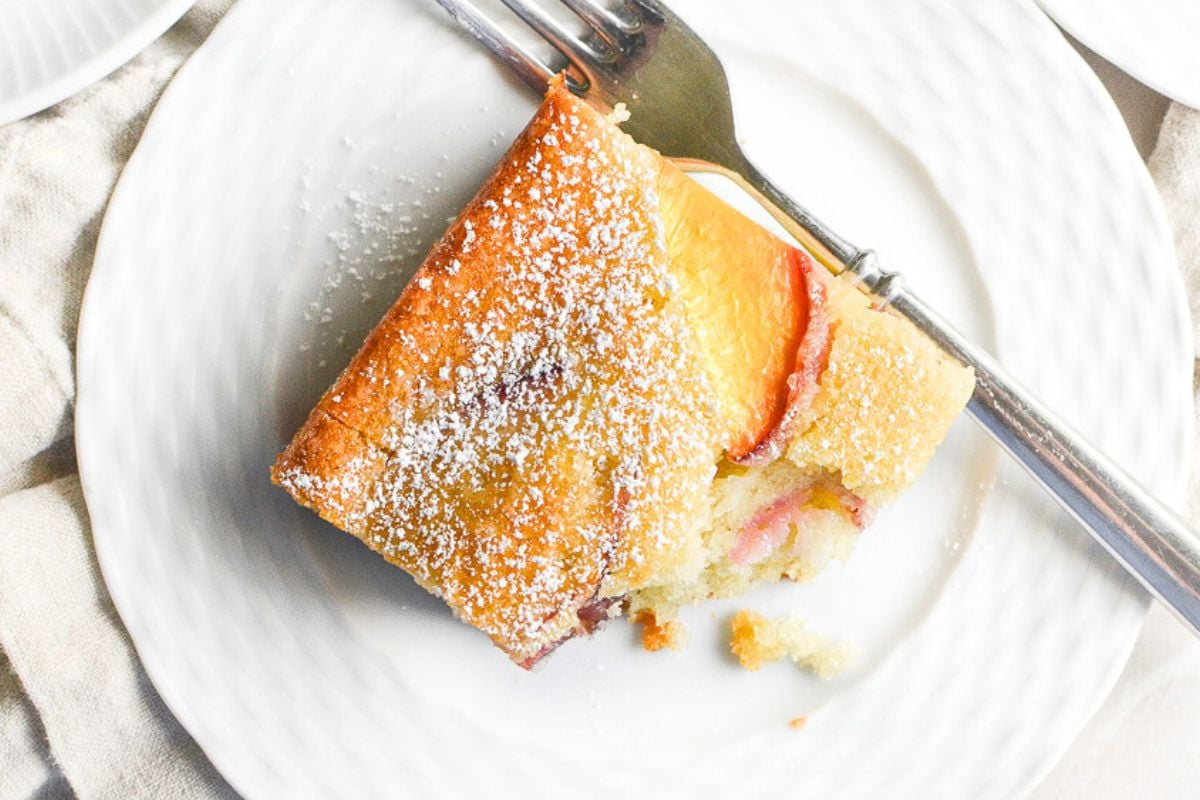 a slice of almond peach cake.