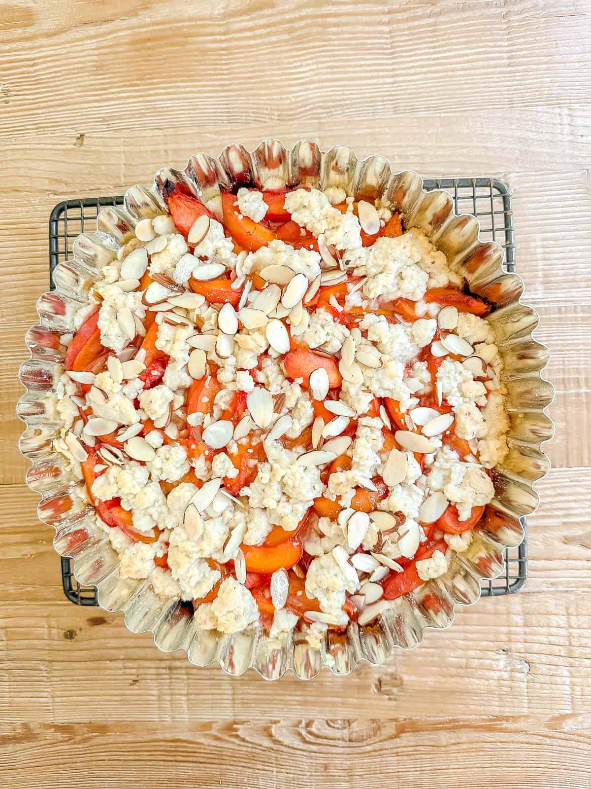 apricot almond tart baked in a tart pan.