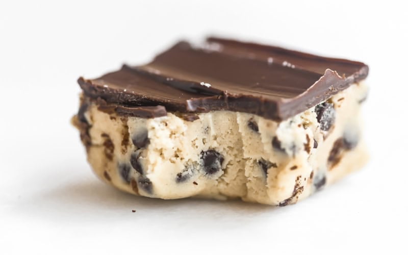 an safe edible cookie dough bar with bite taken.