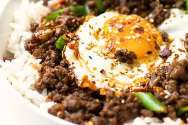 Korean beef rice bowl topped with an egg.