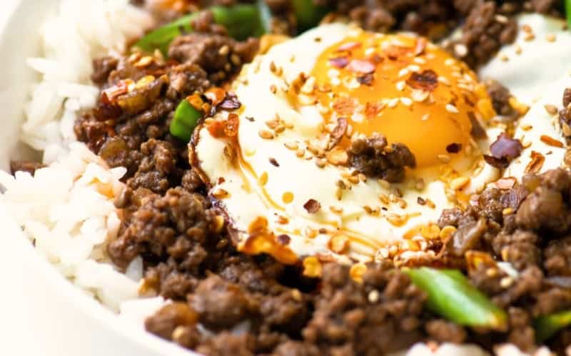 Korean beef rice bowl topped with an egg.