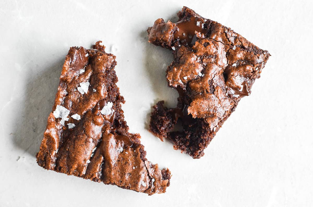 A brownie, broken in half.