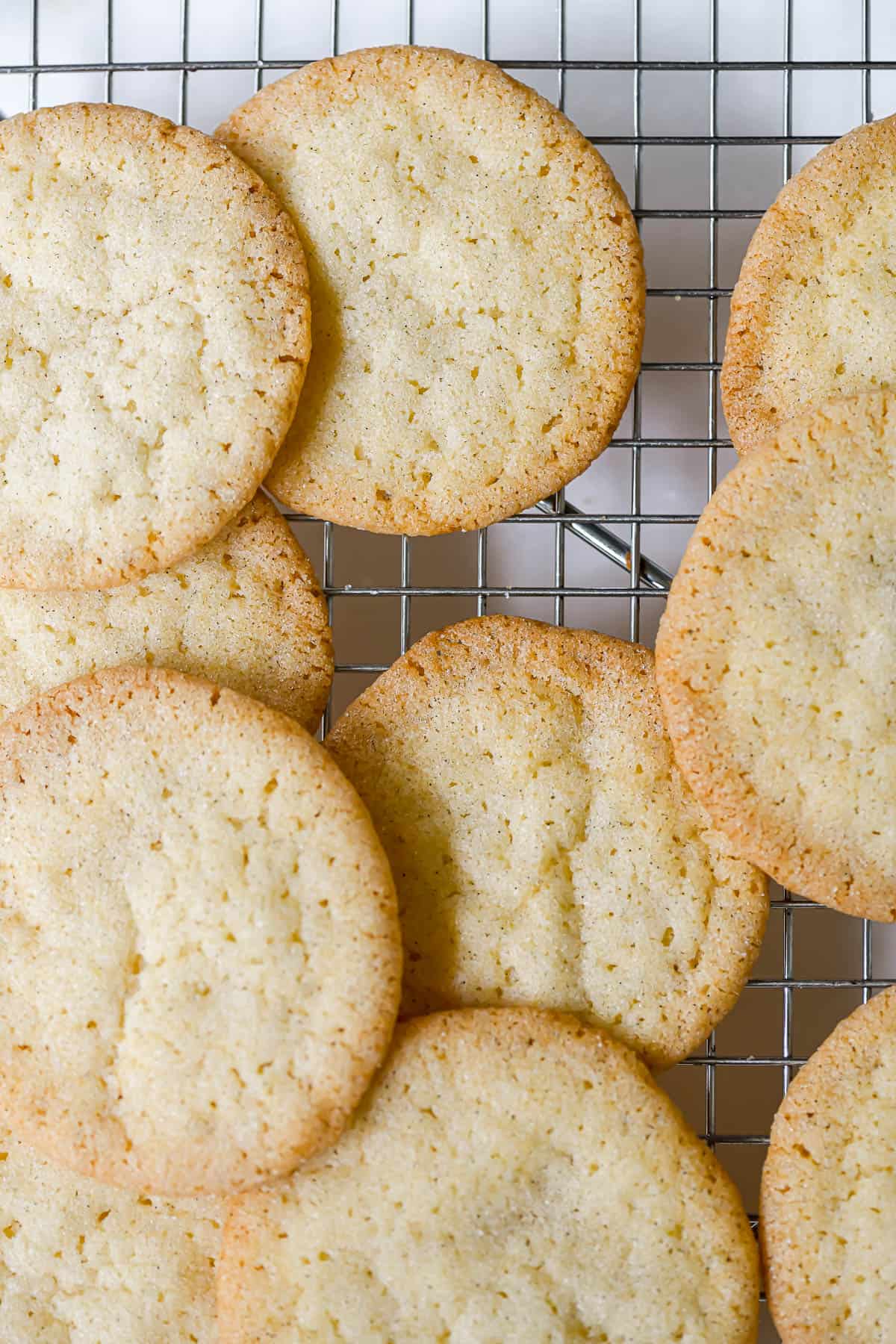 Thin and Crispy Sugar Cookies on a cooling rack.