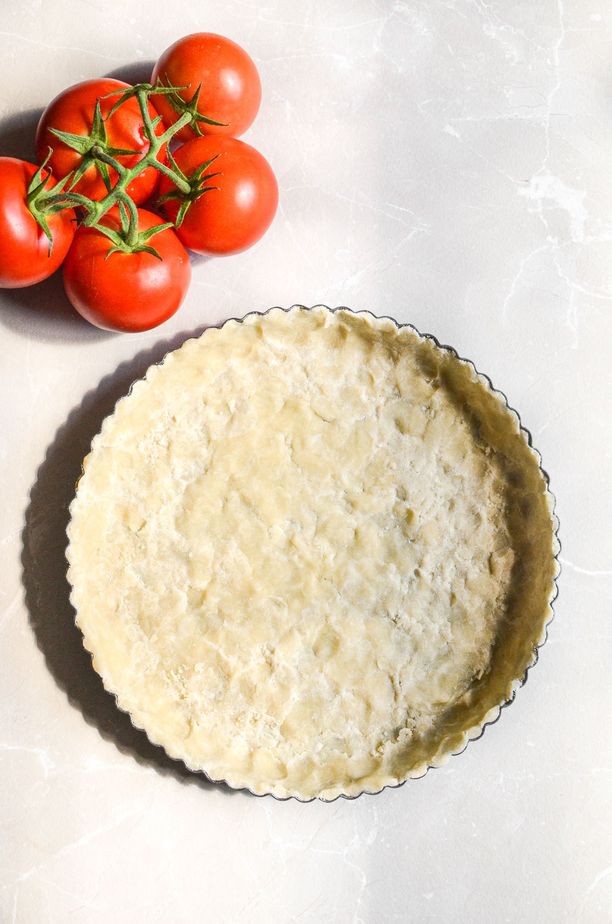 Press in tart crust for a tomato tart.