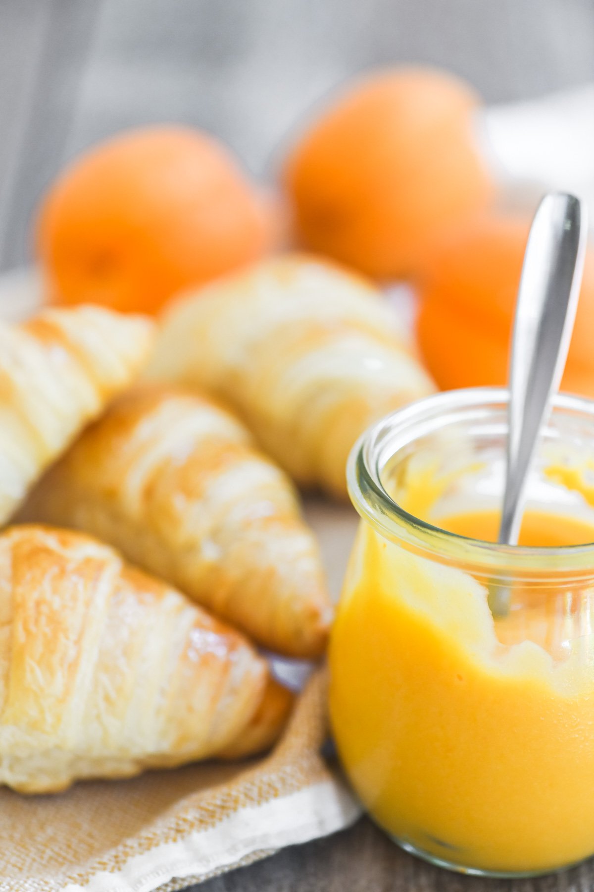 bright orange apricot curd in a jar.