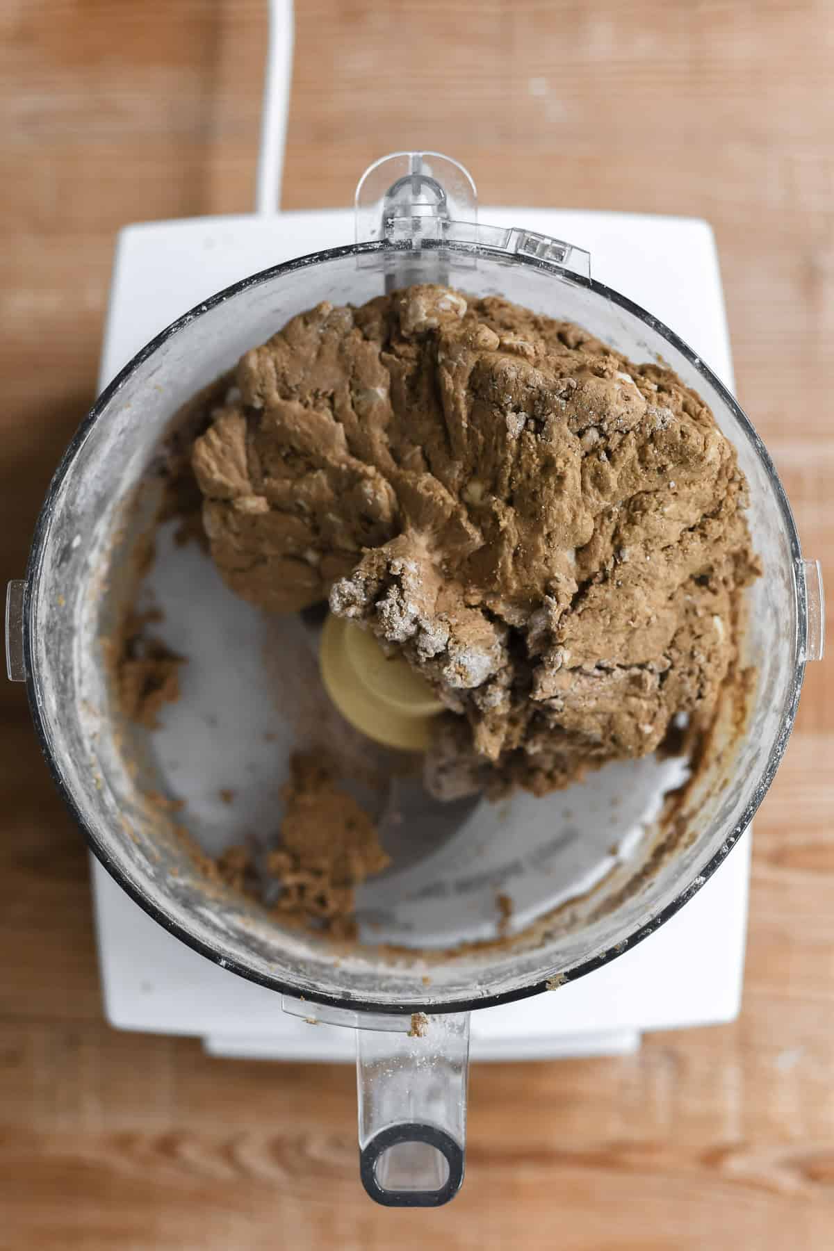 pumpernickel biscuit dough in food processor.