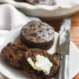 deep brown pumpernickel biscuits with melting butter.