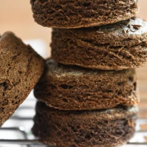 a stack of brown pumpernickel biscuits.