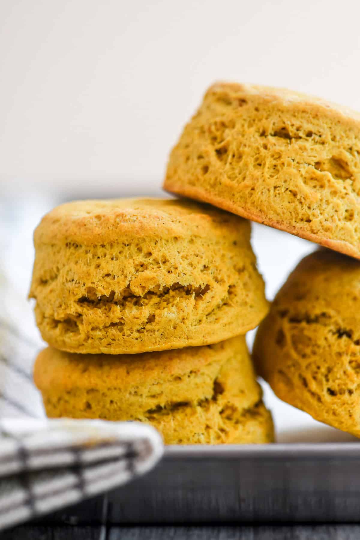 a stack of freshly baked pumpkin spice biscuits.