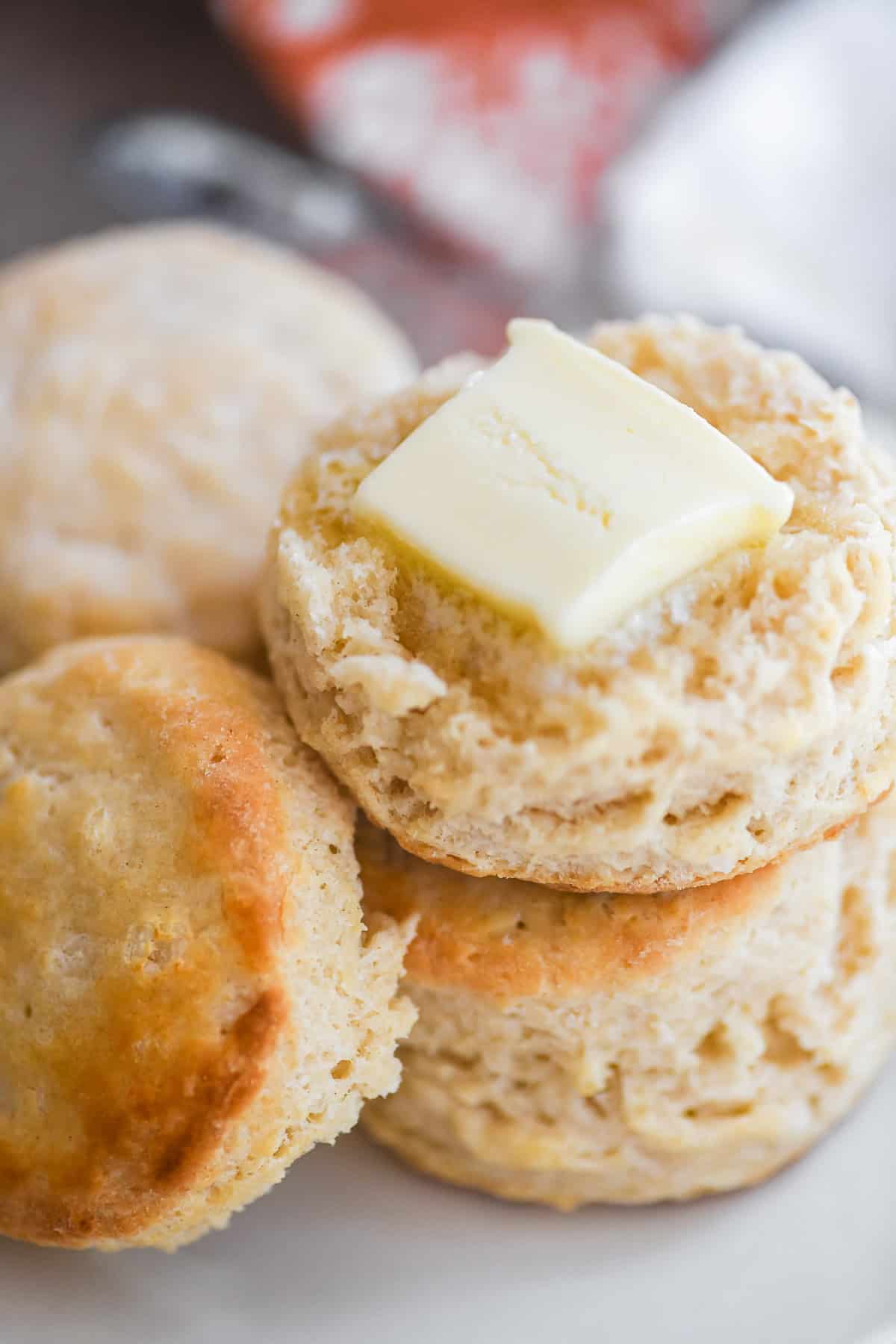 3 ingredient biscuits split with melting butter.