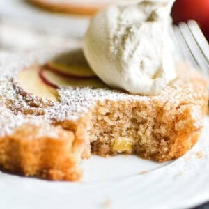 a mini apple spice cake topped with cinnamon rye whipped cream.