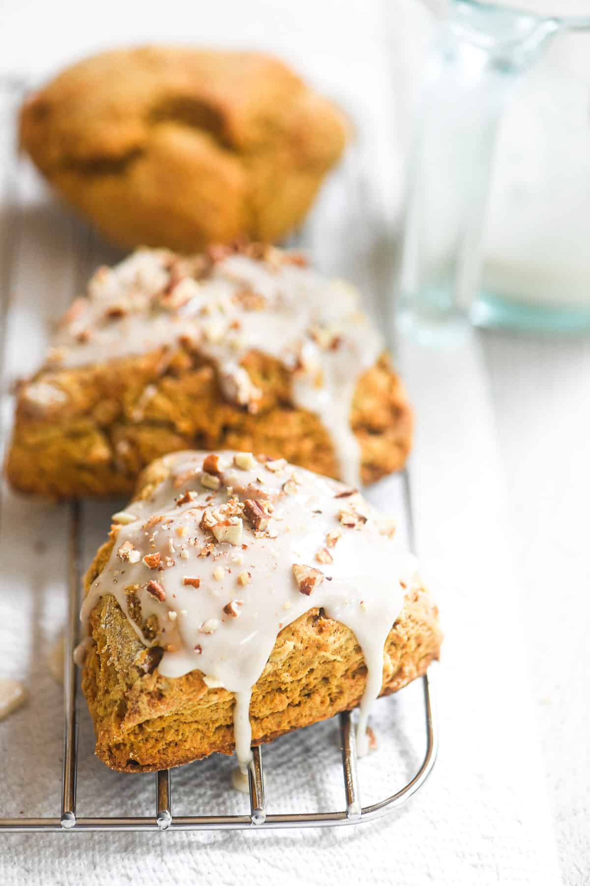 glazing pumpkin scones.