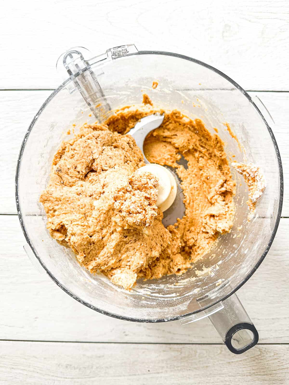 making pumpkin scone dough in food processor