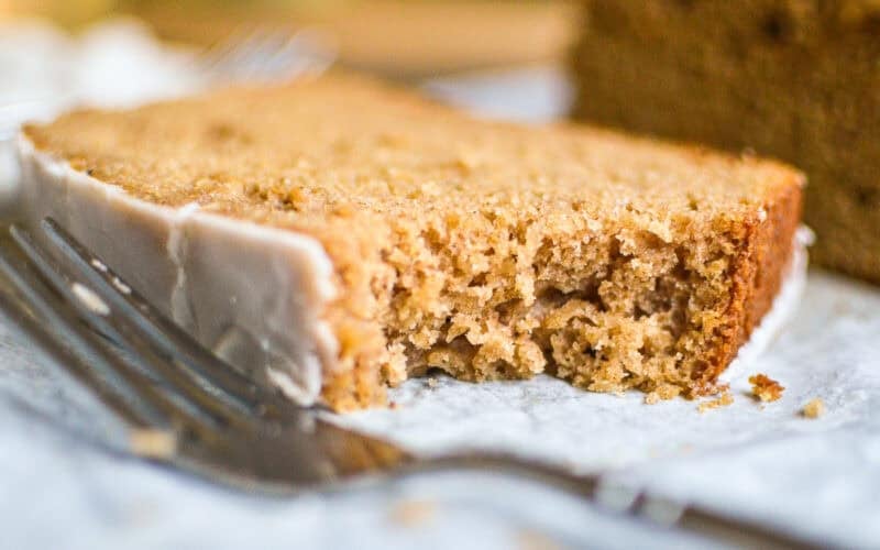 Taking a bite of a slice of apple spice cake.