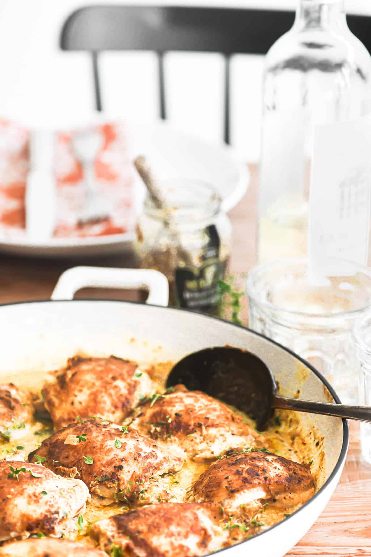 Serving French mustard chicken with white wine.