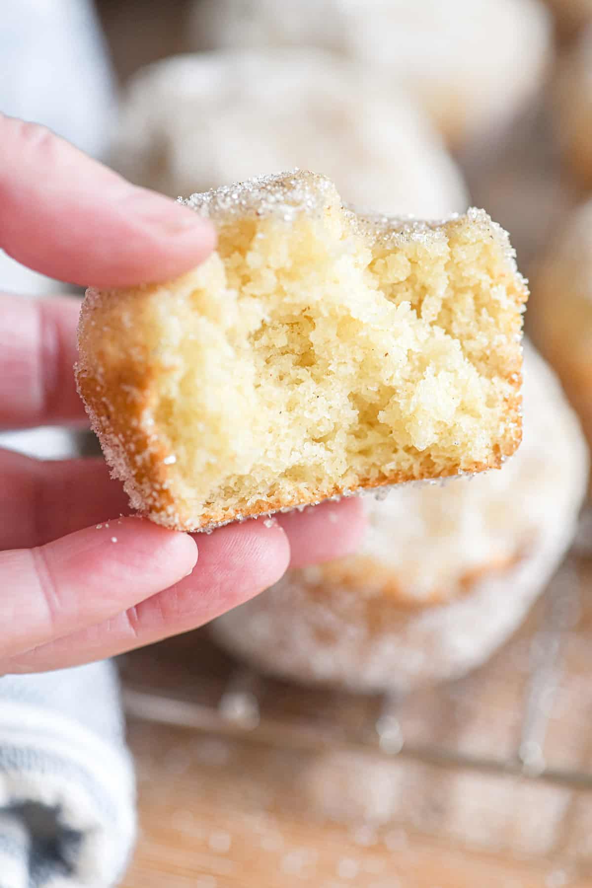 a Swedish breakfast puff broken in half to show the fluffy interior.