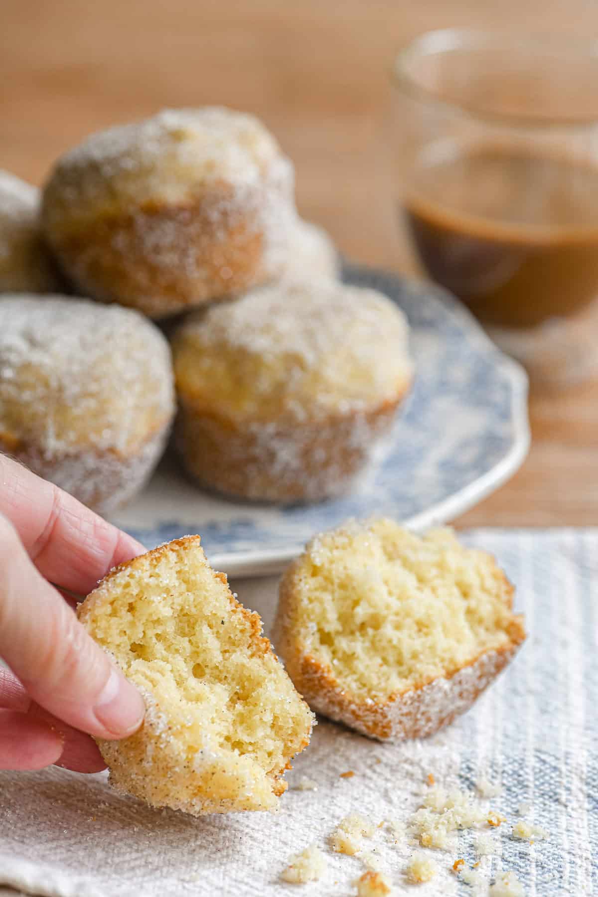 Swedish breakfast puffs with one broken in half to show texture.
